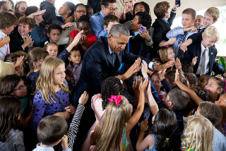 High-fives. July 25, 2015White House Photo by Pete Souza